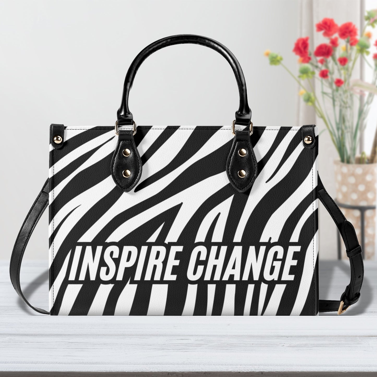 INSPIRE CHANGE • THE LEATHER TOTE