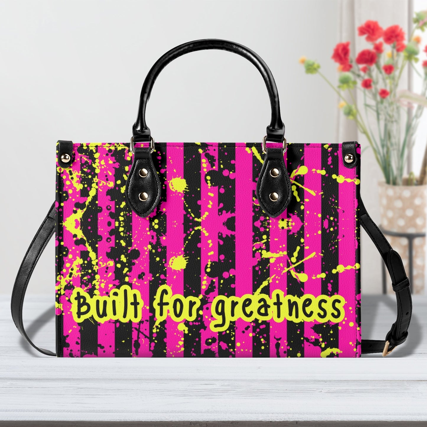 BUILT FOR GREATNESS • THE LEATHER TOTE